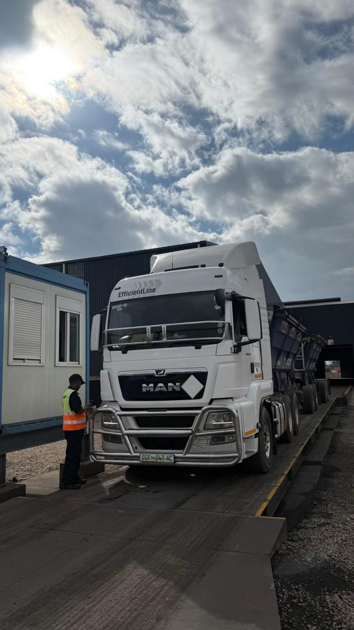 CWG Logistics MAN EfficientLine truck at weigh bridge